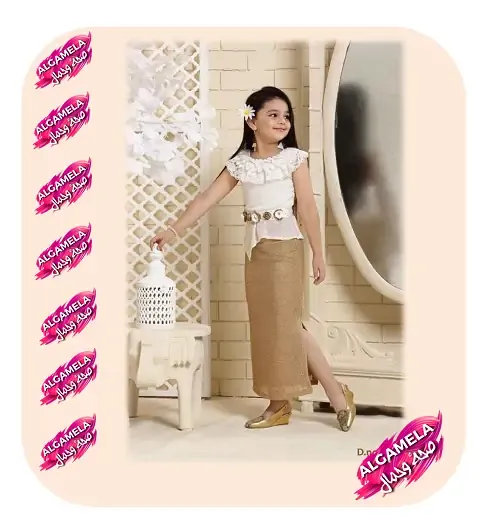 فستان أطفال سواريه سك طويل يمزج بين سحر الأنحاسي و نقاء الأبيض