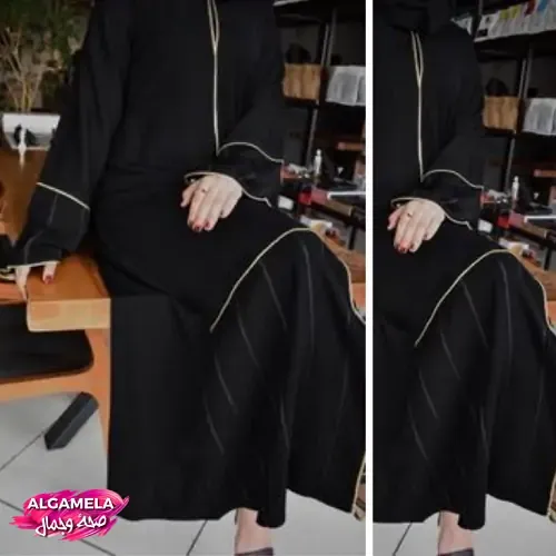 عبايات سوداء: اجعلي إطلالتك جذابة بأحدث تشكيلة من العبايات تتميز بتصميم كوري بسيط مع خطوط زينة دقيقة على الأكمام والجزء السفلي.