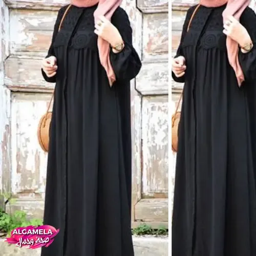 عبايات سوداء: اجعلي إطلالتك جذابة بأحدث تشكيلة من العبايات هذا العباية عبارة عن أقمشة أنيقة من ماركة "إيمينوس بوتيك" (Eminos Butik) وتتميز بتصميم مزين بالنقوش على الصدر.